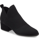 Load image into Gallery viewer, Outer front side view of the eileen fisher clever knit bootie. This bootie us black with a knitted fabric upper, side slits, and a block heel.
