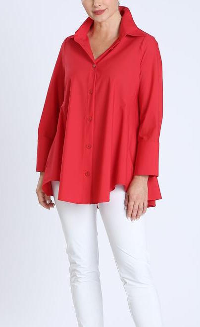 Front top half view of a woman wearing white pants and the IC collection Red Shirt. This shirt has a button up front, a notched shirt collar, and long sleeves.