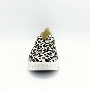 Front view of the ilse jacobsen leopard flat. This flat has black and green leopard print all over it with a creme base. The sole is white and the upper has perforated holes all over it.