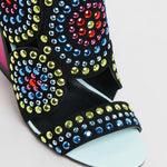 Load image into Gallery viewer, Front, close up view of the kat maconie frida multibrights high heels. This shoe is black with multicolored rhinestones arranged in circles. The toe bed is open. 
