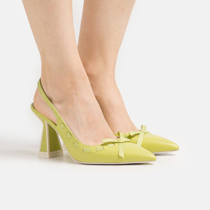 outer side view of a pair of the kat maconie Kacy high heel in the color celery.