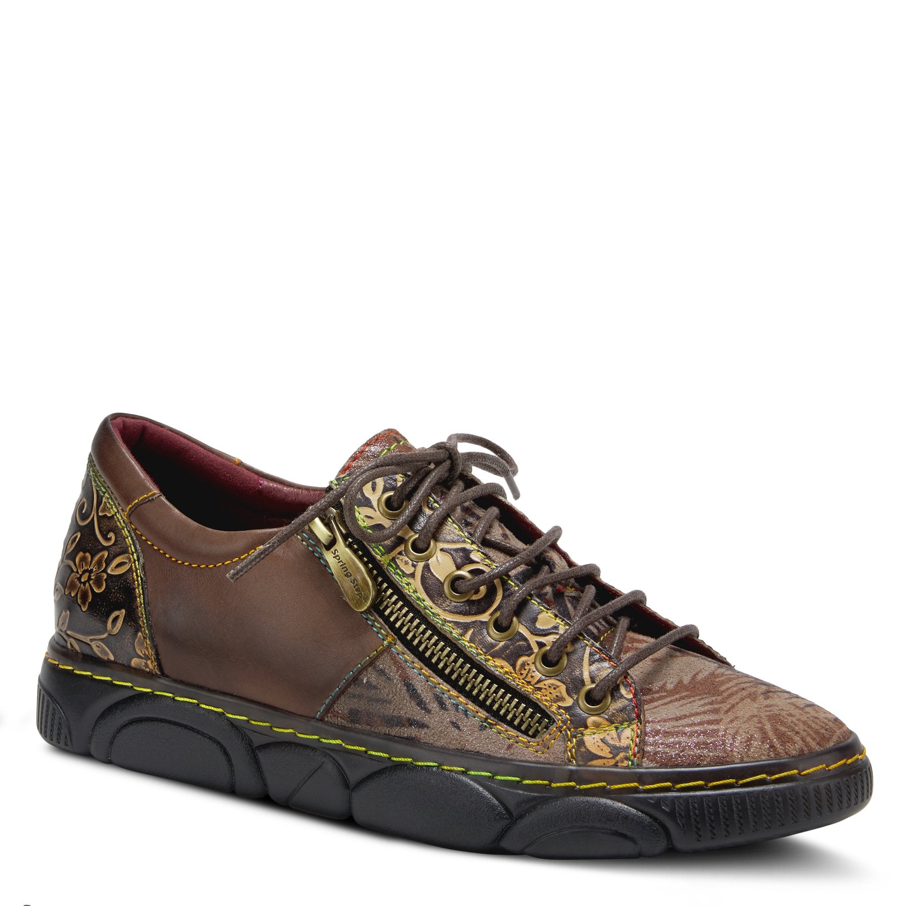 Outer side front view of the L'Artiste Danli Sneaker. This sneaker is taupe colored with a painted leather upper, a lace up front, an off front center zipper, and a black sole.