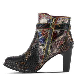Inner side view of the l'artiste daydream bootie. This bootie is black with a floral snakeskin print and a fish-scale multi color print. This bootie has a high heel and an inner zipper.