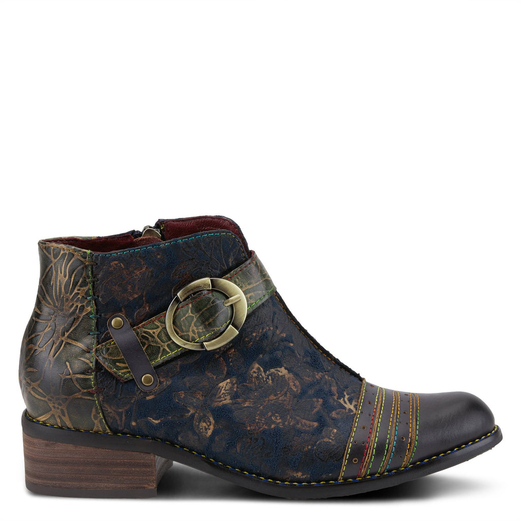 Outer side view of the l'artiste georgiana boot. This boot is blue multi with a subtle gold floral print and a decorative buckle strap across the front.