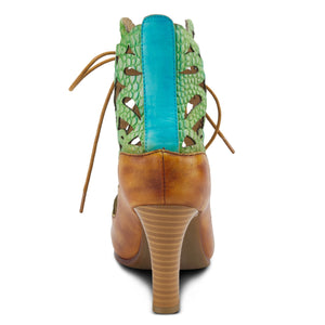 back view of the l'artiste osocool sandal. This sandal is an open toe high heel with green and blue floral cutouts through out the upper. The upper goes up to the ankle and has a lace up closure. The sandal also features tan edging and a blue strip on the closed back.