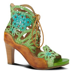 Load image into Gallery viewer, Outer view of the l&#39;artiste osocool sandal. This sandal is an open toe high heel with green and blue floral cutouts through out the upper. The upper goes up to the ankle and has a lace up closure. The sandal also features tan edging.
