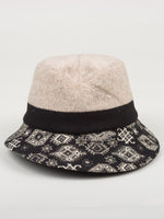Load image into Gallery viewer, Front view of the lillie &amp; cohoe morocco alexa hat. This hat is beige with a black band around the crown. The short brim has a black and beige print.
