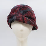 Load image into Gallery viewer, Front view of a the lillie &amp; cohoe iconic prints lexi hat. This has has red and grey plaid and a tiered/folded crown. The right side of the hat has a decorative black buckle.
