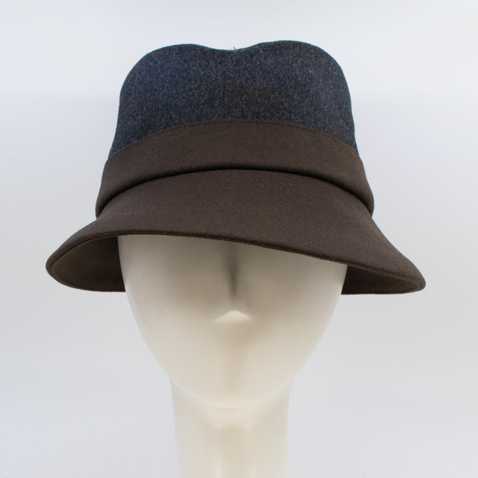 front view of the lillie & cohoe midnight/brown wool classic alexa hat. This hat is midnight blue on the top and dark brown on the bottom. The hat has a flat brim.