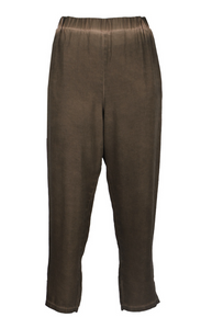 Front view of the luukka dyed tencel khaki pant. This pant is brown with a relaxed v-shape and elastic waistband. It is also cropped.