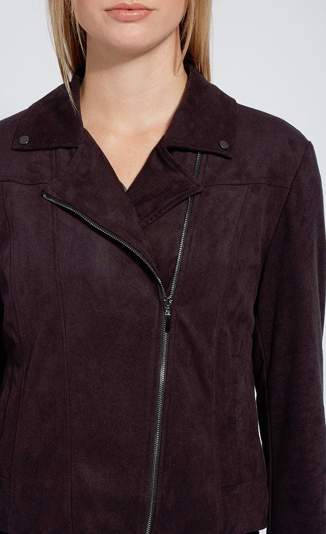 Front close up view of a woman wearing the black lysse spice fringe jacket. This jacket is suede looking. It has an off-center front zipper.