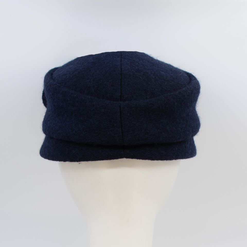 Back view of the mao now hat in navy. 
