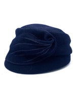 Load image into Gallery viewer, Left side view of the mao now hat in navy. This hat has a large stitched leaf on the left side.
