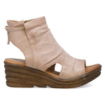 Load image into Gallery viewer, Outer side view of the miz mooz anna in the color pearl. This color is a faded pink. The upper covers most of the foot with small exposed sides, an exposed heel, and an open toe. The sandal has a brown wedge heel.
