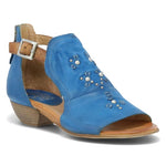 Load image into Gallery viewer, Front outer side view of the miz mooz canary sandal in the color denim. This sandal has an open toe, a mid-heel, a buckle strap around the ankle, and exposed sides.
