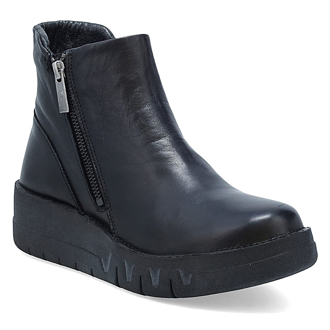 front outer side view of the miz mooz lass boot. This boot is in black and has a wedge heel. The outer side has a zipper.
