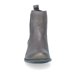 Front view of the miz mooz lewis bootie in the color graphite/grey. This flat bootie has black elastic gores on the side and a pull tab on the back.
