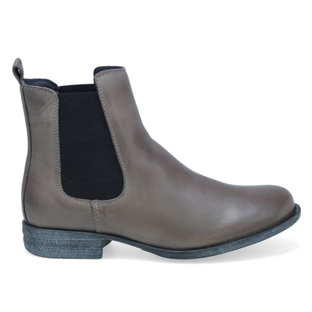 Outer side view of the miz mooz lewis bootie in the color graphite/grey. This flat bootie has black elastic gores on the side and a pull tab on the back.