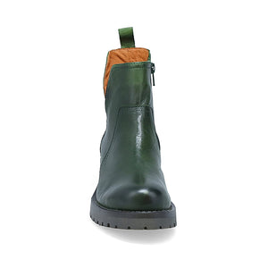 front view of the miz mooz poolie bootie in the color kiwi (green). This bootie has an outer side out out and a lug sole.
