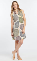 Load image into Gallery viewer, Front full body view of a woman wearing the nic + zoe citrus dress. This v-neck dress is sleeveless and sits above the knees. It is pale yellow and grey with a large citrus slices print in yellow, blow and pink. 
