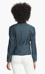 Load image into Gallery viewer, Back, top half view of a woman wearing white pants and the Nic + Zoe Favorite Denim Jacket. The dark denim jacket features frayed stiching, a cropped cut, and a short stand collar.
