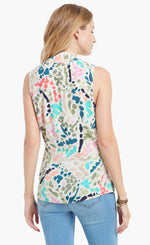 Load image into Gallery viewer, Back top half view of a woman wearing denim pants and the nic+zoe splash tank. This tank has multicolored dots all over it and a v-neck.
