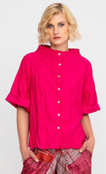 Load image into Gallery viewer, front view of a woman wearing the ozai n ku crinkle funnel shirt in fuchsia
