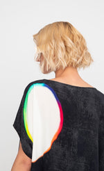 Load image into Gallery viewer, Back top half view of a woman wearing the ozai n ku orbits top in black multi. 

