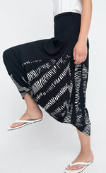 Load image into Gallery viewer, Left side bottom half view of the ozai n ku bliss long skirt.
