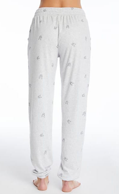 Back bottom half view of a woman wearing the PJ Salvage Lily Rose Banded Pant. The banded pant is a heathered light grey with tiny french bulldog faces printed on it in black.