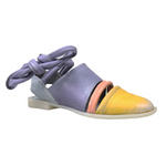 Load image into Gallery viewer, Outer side view of the papucei etsy shoe. This shoe is flat. The front leather portion that covers the toe is yellow. The strap over the inset is pink and the rest of the shoe leather is purple. This shoe also has purple leather ankle ties.
