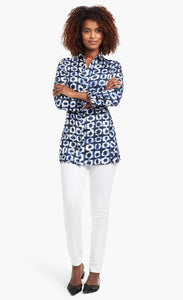 Front full body view of a woman wearing the Nic+Zoe Stretch Shibori Blouse. This indigo shibori printed shirt has a button down front, 3/4 length cuffed sleeves, and a collar.