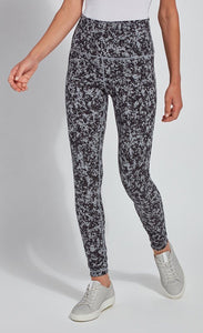Front, bottom half view of a woman wearing the Lysse Reversible Cotton Legging. This side of the high-waisted legging has a grey and black speckled print. 