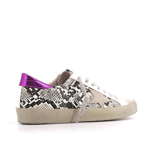 Outer back side view of the shushop paloma sneaker. This sneaker is taupe with snake print sides, a fuschia pink, back and a lace up front 