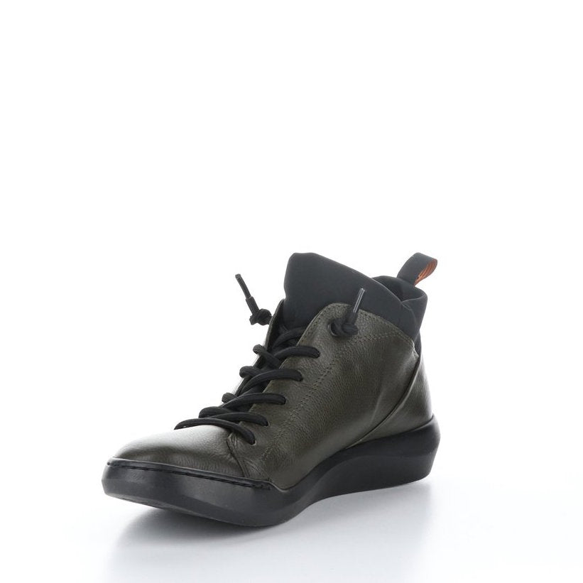 Inner front side view of the softinos biel high top sneaker in army/black. This sneaker has a lace up front, a green outer, and a black sock/like liner.