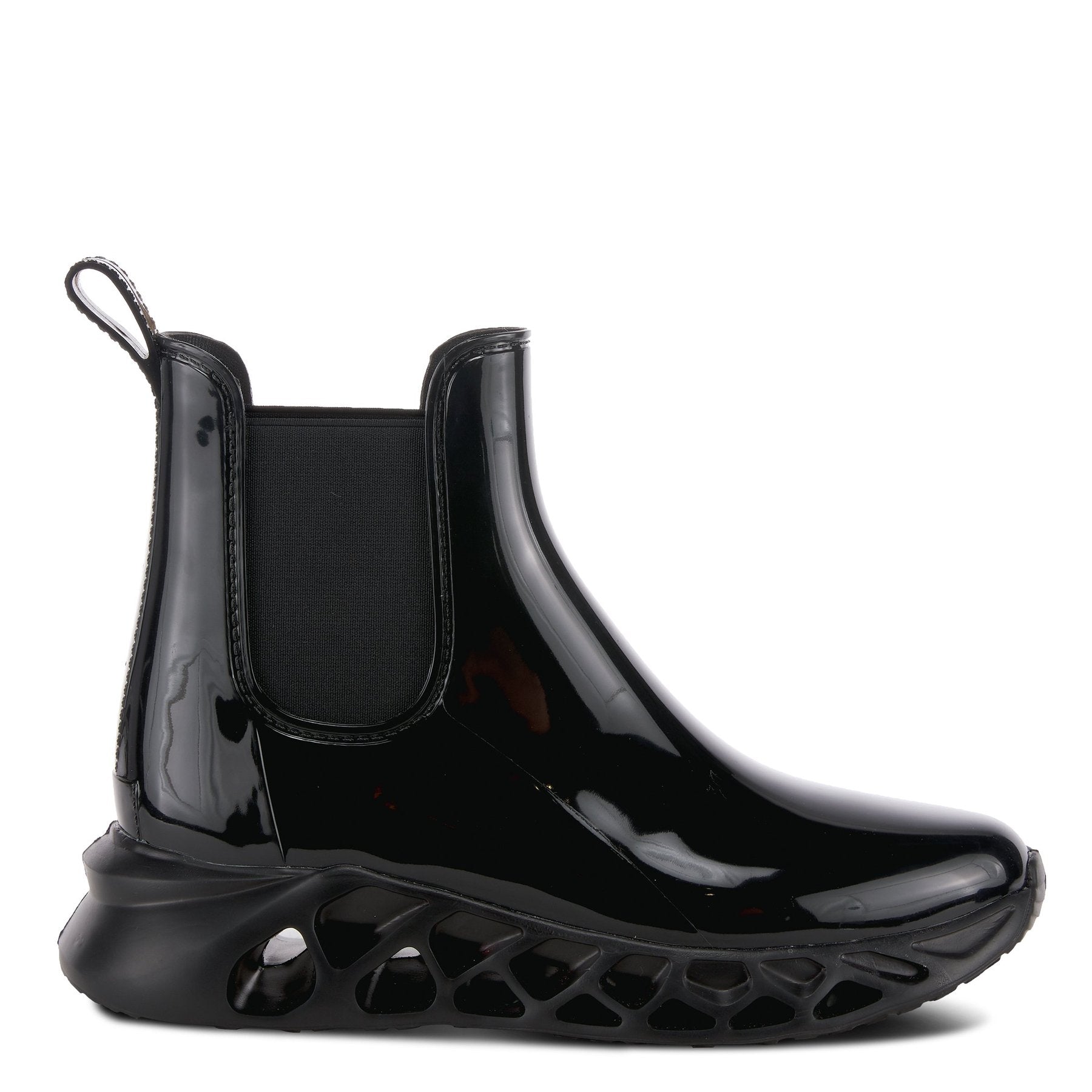 Outer side view of the yasmine boot. This black boot is rubber with elastic side gores and rubber soles with holes.