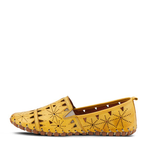 Inner side view of the spring step fusaro loafer. This slip on loafer is yellow with geometric cut outs and elastic v-shaped goring.
