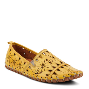 Outer front side view of the spring step fusaro loafer. This slip on loafer is yellow with geometric cut outs and elastic v-shaped goring.