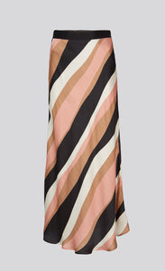 Front view of the summum striped waves printed maxi skirt. This skirt has different sized wavy stripes in black pink, taupe, and white that run diagonally across it. The skirt ends just above the ankles.