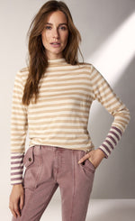 Load image into Gallery viewer, front top half view of the summum striped tone-on-tone shirt. This top has neutral brown stripes with contrasting wine stripes on the end of the long sleeves. The top also has a slight funnel neck.
