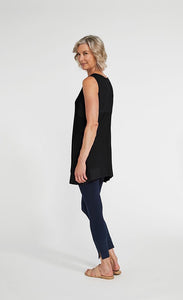 Back full body view of a woman wearing blue leggings and the sympli motion trim tank. This sleeveless tank is black with a round neck and a flared out hem that sits below the hips.