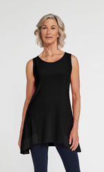 Load image into Gallery viewer, Front top half view of a woman wearing blue leggings and the sympli motion trim tank. This sleeveless tank is black with a round neck and a flared out hem that sits below the hips.
