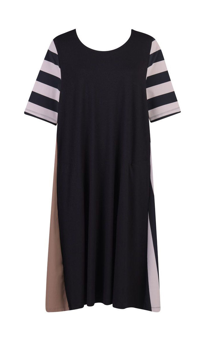 Front view of the alembika tekbika stripe dress. This dress is black with one brown side, one striped side, and striped elbow length sleeves. The dress sits at the knees.
