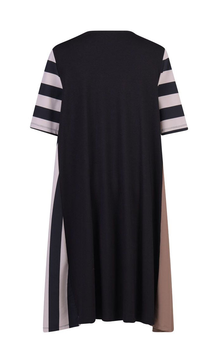 Back view of the alembika tekbika stripe dress. This dress is black with one brown side, one striped side, and striped elbow length sleeves. The dress sits at the knees.