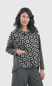 Front top half view of the alembika RILEY TRAPEZE TOP in a retro print/color. This print is black/grey with a cream geometric print on top. The drop shoulder long sleeves have a grey textured print similar to the swing back.