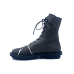 Load image into Gallery viewer, Inner side view of the trippen kintsugi ankle boot. This boot is in the color shark with cracked silver seams on the front. It is flat with a lace up front.
