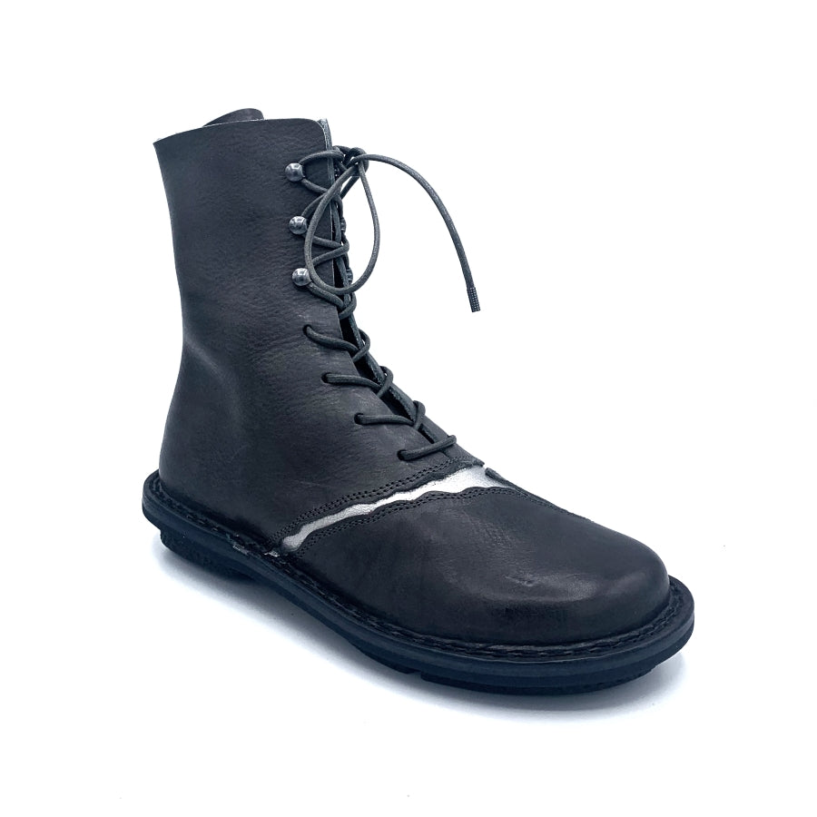 Outer side front view of the trippen kintsugi ankle boot. This boot is in the color shark with cracked silver seams on the front. It is flat with a lace up front.