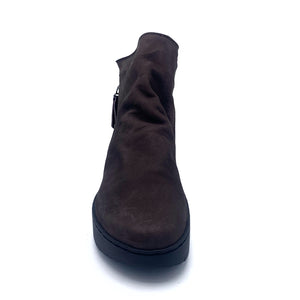 Front view of the trippen tourist in the color camel. This bootie has an outer zipper and a round toe.