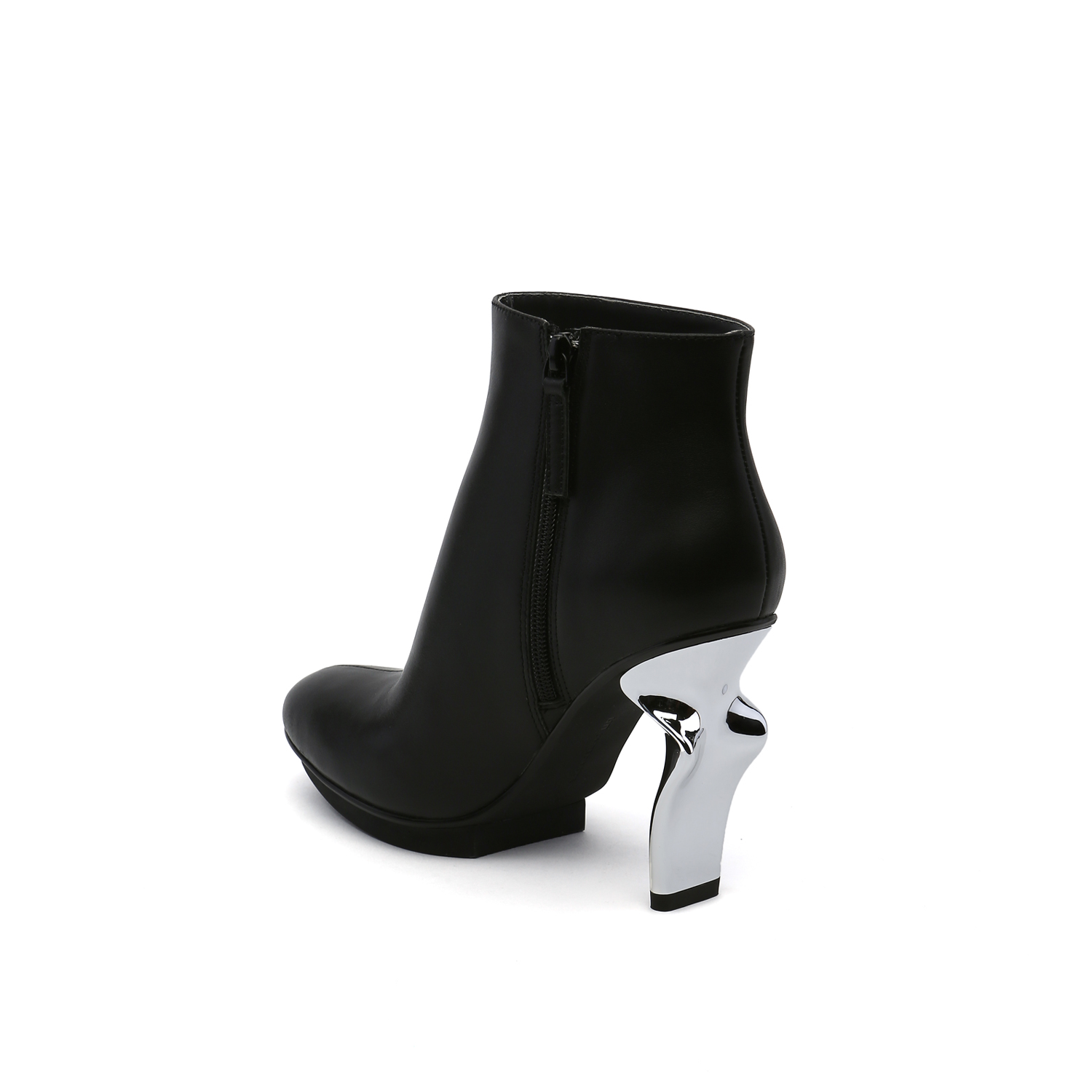 inner back side view of the united nude twirl bootie. This bootie is black with a metallic spiraling high heel and an inner zipper.