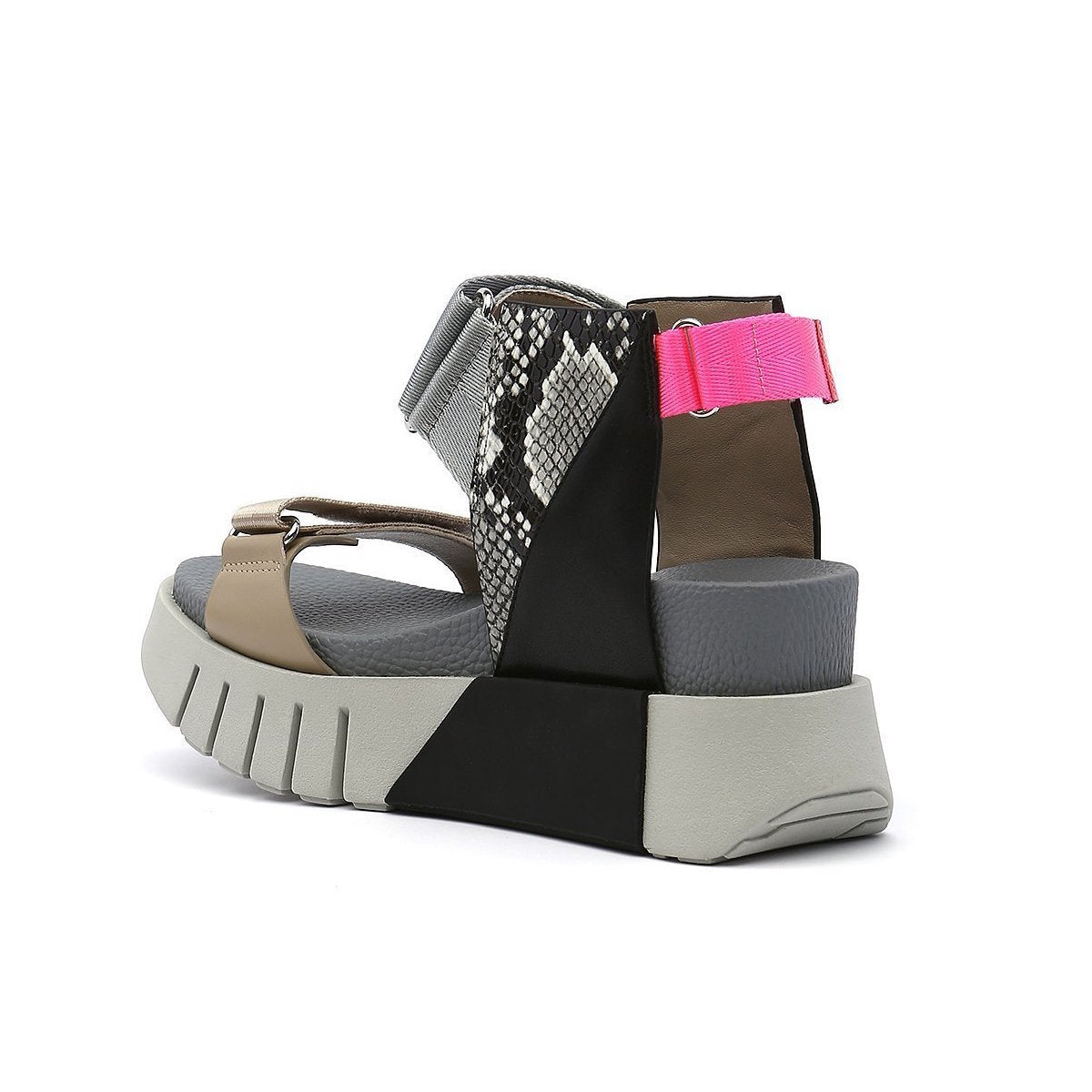 Inner back view of the united nude delta run sandal. This sandal is grey with gold, black, snake print, and a touch of hot pink. The sandal has a white platform sole and adjustable back, ankle, and toe bed straps.